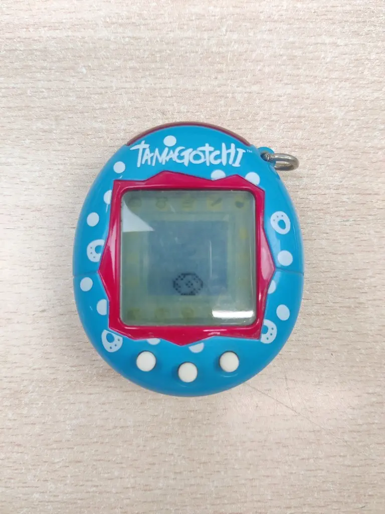 Tamagotchi Blu con Impronte di Zampa - Bandai 2004 Funzionante + Batteria Nuova - Vista 1