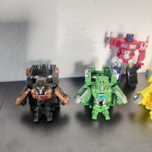 Miniatura 3 per Lotto 5pz Optimus Prime Brawl - Transformers Bot-Shots DinoBot Robots Hasbro