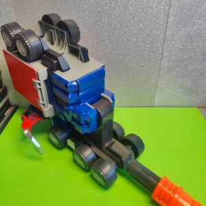 Miniatura 2 per Hasbro Transformers Optimus Prime Battle Rig Blaster